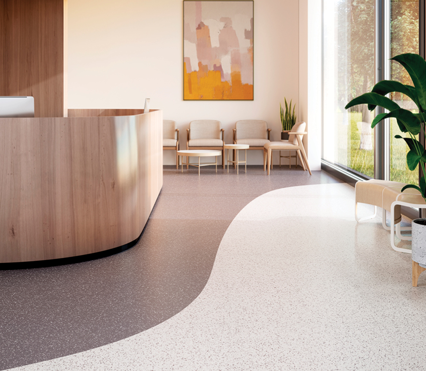 Healthcare lobby with reception desk and chairs
