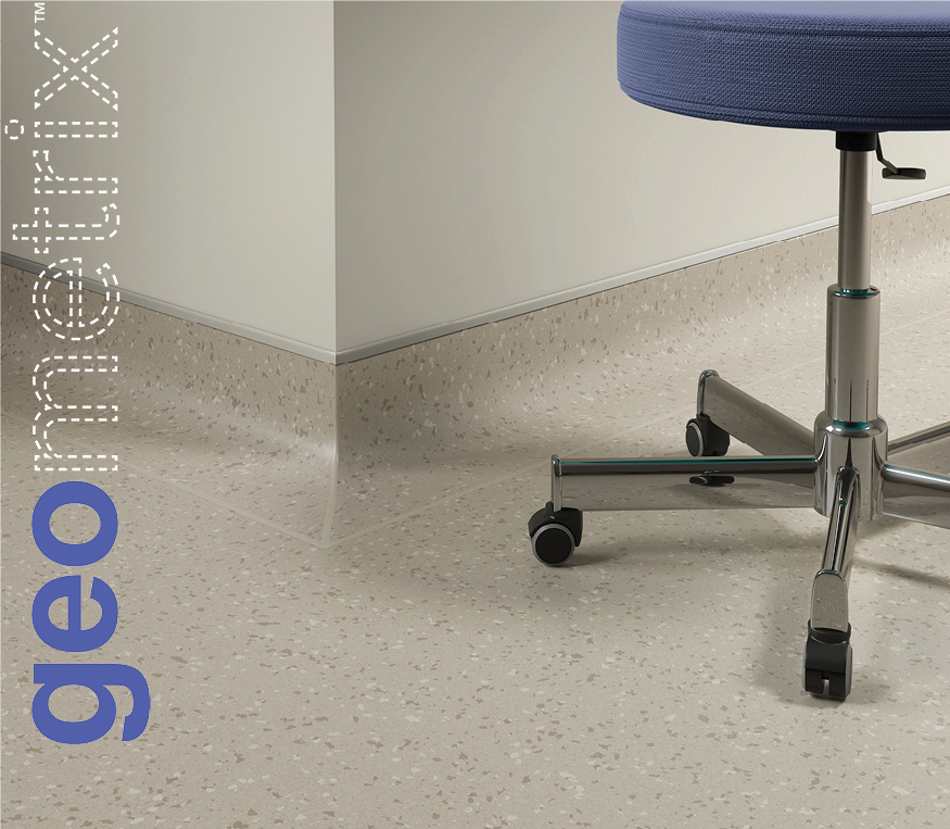 Rolling stool on resilient flooring with the text geometrix